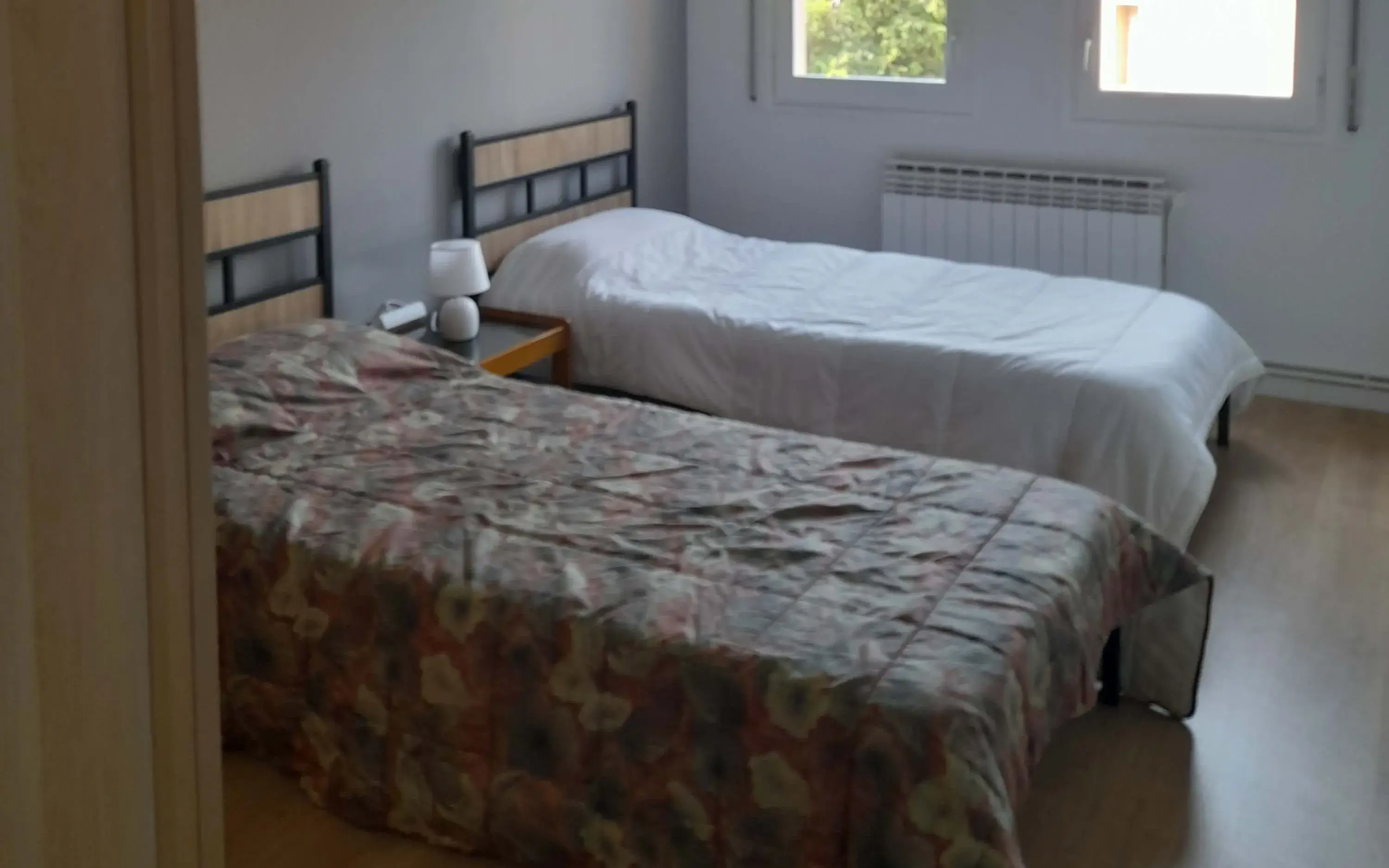 One of the rooms in the apartment provided by Sonrisas de Bombay for six men who are victims of labor exploitation.