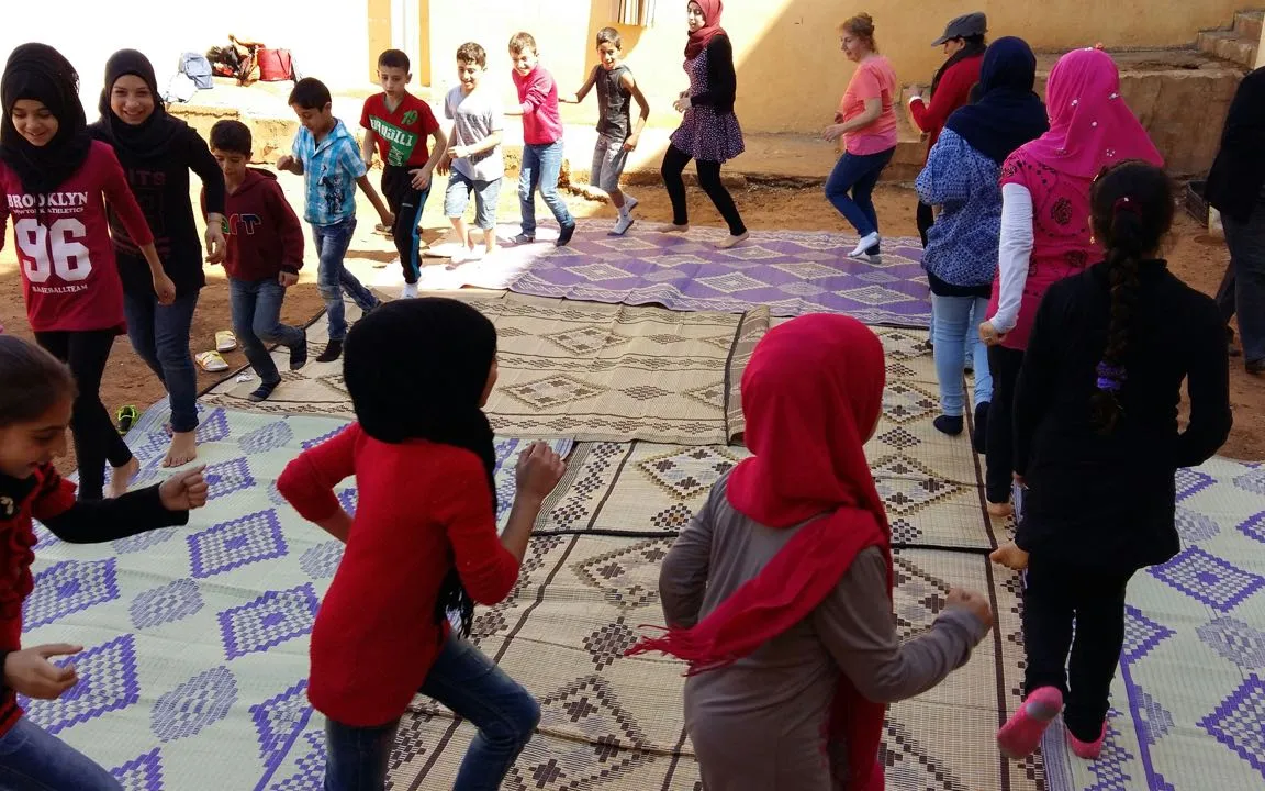 Playing / Photograph: BEYOND Association 