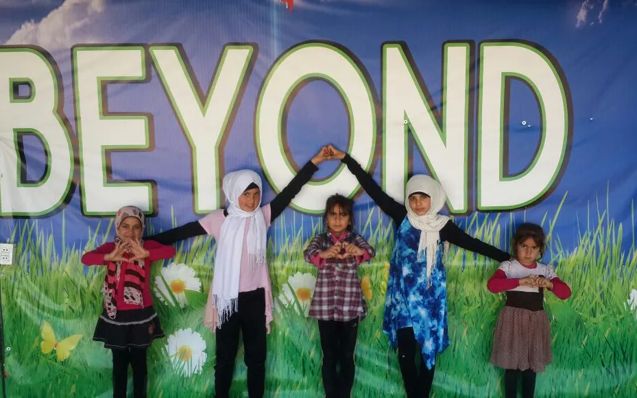 Children with BEYOND Association's logo / Photograph: BEYOND Association 