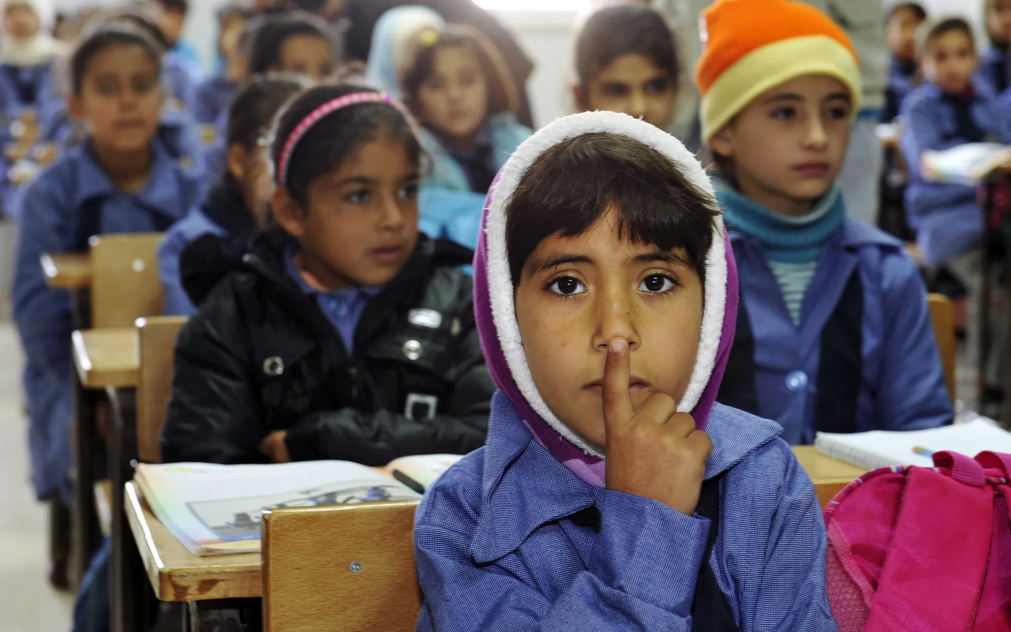 Children inside a classroom at Za’atri refugee camp, host to tens of thousands of Syrians displaced by conflict, near Mafraq, Jordan / Photograph:  UN Photo/Mark Garten, Flickr