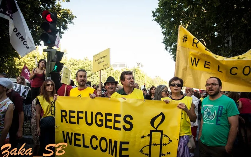 Demonstration run by Amnesty International in favour of welcoming refugees. Photo: Zakaria Semmar Benani, Flickr