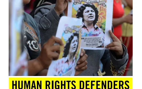 Front cover of the briefing ‘Human rights defenders under threat’. Photo: Amnesty International