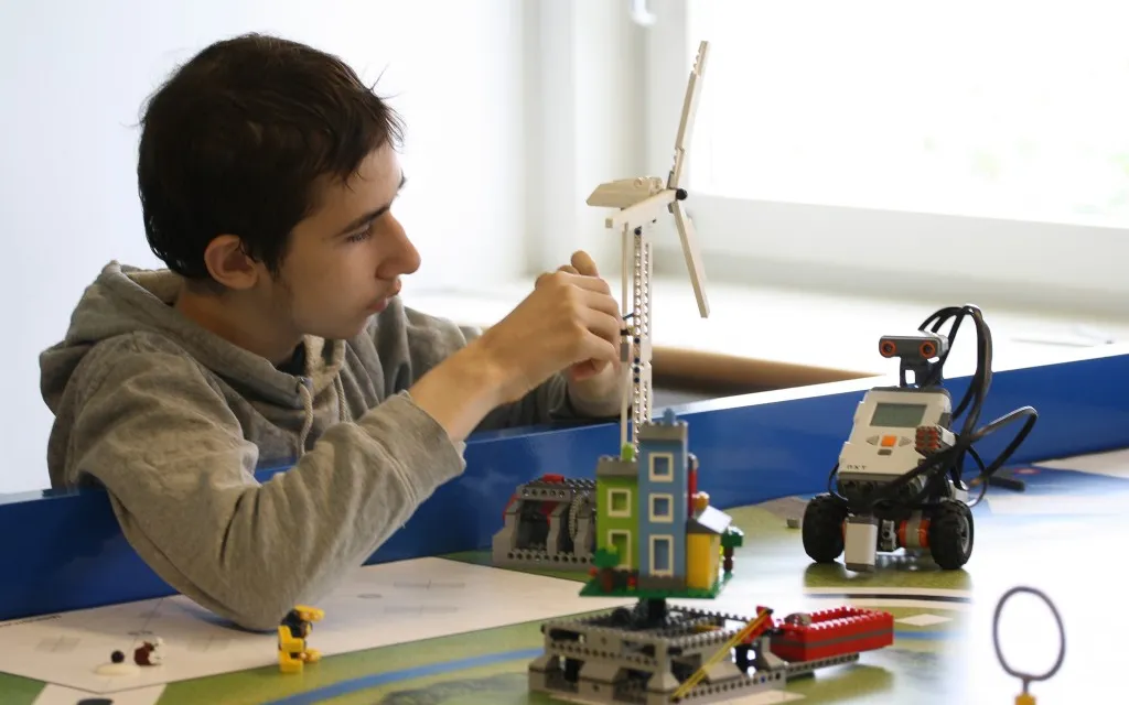 Young boy with autism in a training. Photo: Specialisterne Foundation