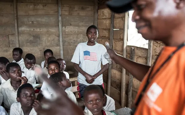 School time in a refugee camp in  Democratic Republic of Congo. The Guardian. 