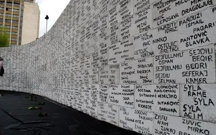 Wall with names of missing people in Kosovo 