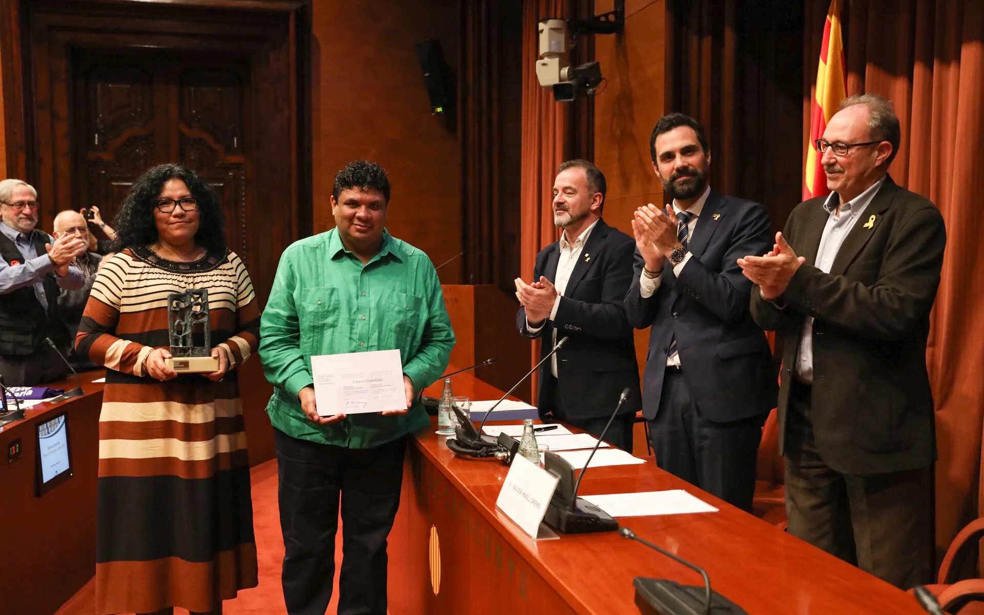 Carlos Cruz and Erika Llanos at the delivery of the ICIP Prize 2018 Peacebuilders.