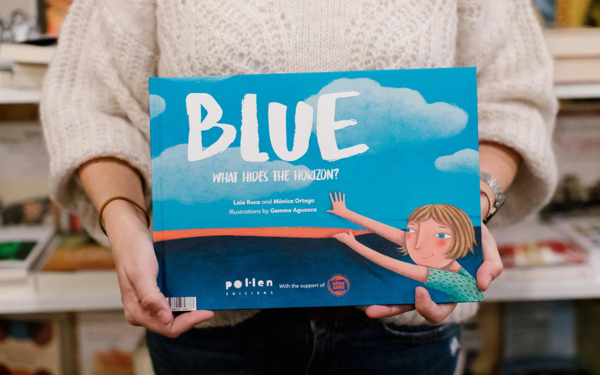'Blue. What hides the horizon?' it’s a book for kids and adults.