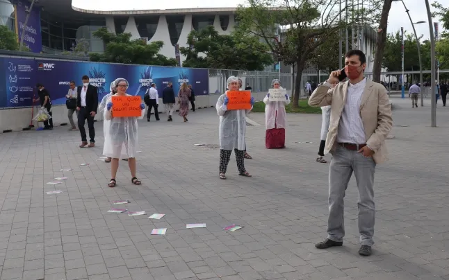 Performance action by Setem Catalunya at the gates of the Mobile World Congress during the 2022 edition.