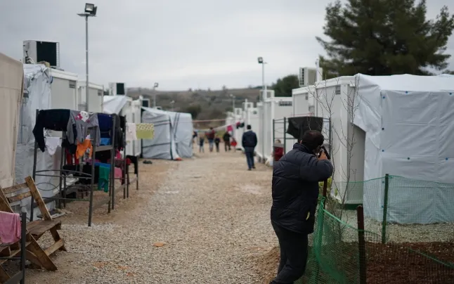 Thousands of people are forced to live in refugee camps on their way to Europe.