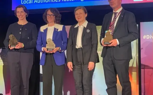 Helena Dalli collecting the award in Brussels. 