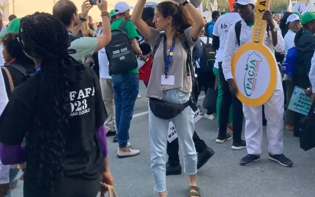 Clàudia Custodio, researcher at the Global Debt Observatory, in an action at COP28.