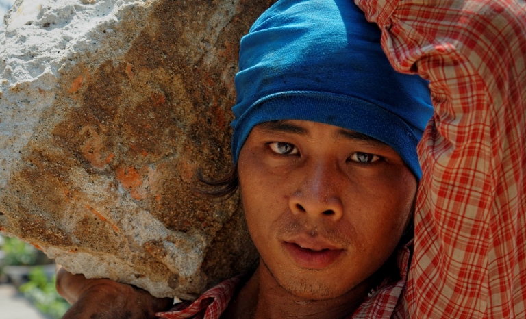 Worker suffering slavery conditions. Photo: 50 for Freedom