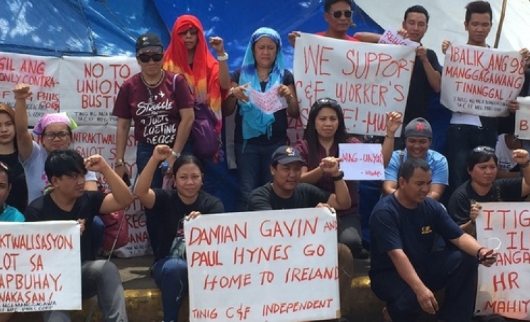 Filipino factory workers protest