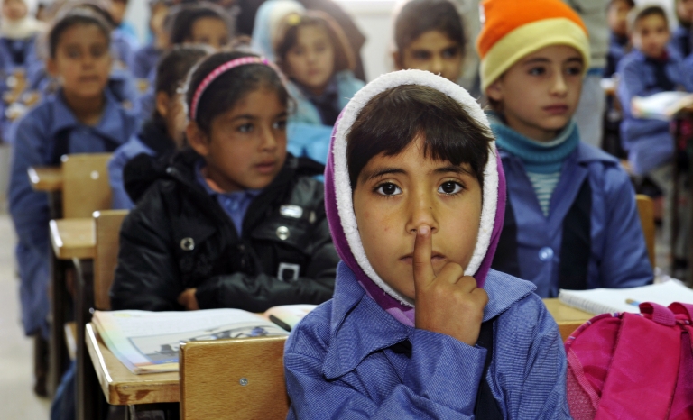 Children inside a classroom at Za’atri refugee camp, host to tens of thousands of Syrians displaced by conflict, near Mafraq, Jordan / Photograph:  UN Photo/Mark Garten, Flickr