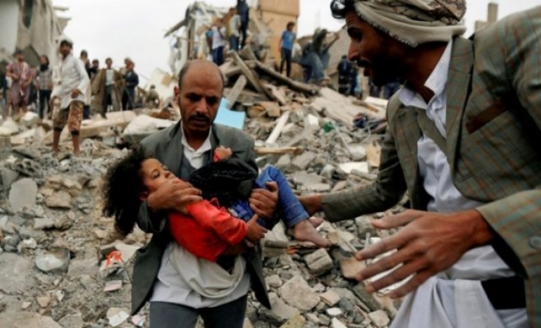 A father rescuing his daughter from airstrikes in Yemen.