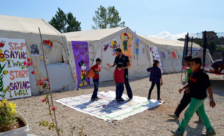 Children during a psychosocial session in a refugee camp / Photograph: BEYOND Association 