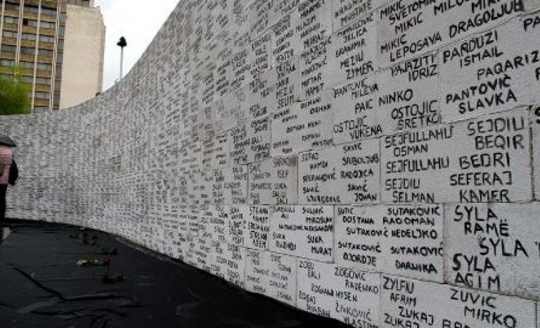 Wall with names of missing people in Kosovo 